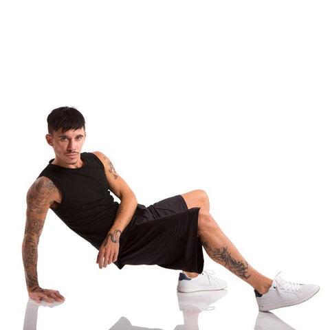 model wearing Energetiks Brayden Tank Black hip hop position