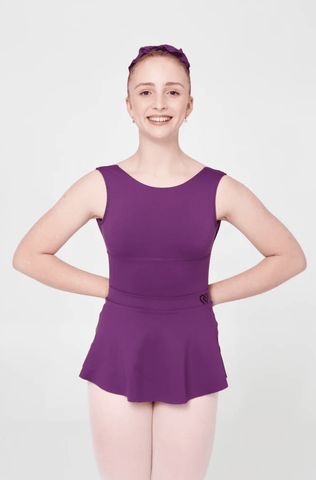 Ballet model wearing Claudia Dean Royal Skirt Plum front view with matching Leotard