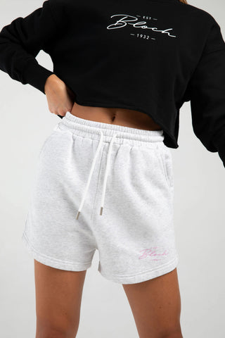 Model wearing Terry High Waisted Short Bloch Snow Marle front view close up