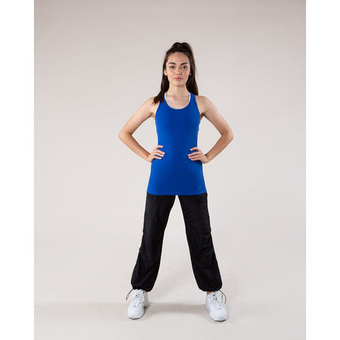 Dance model wearing Energetiks Addison Singlet Cobalt with black pants