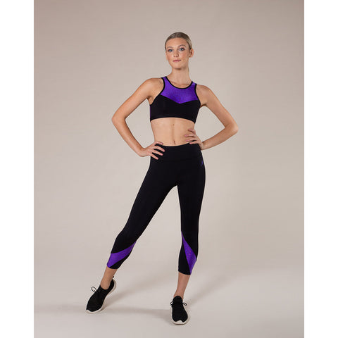 Model wearing Energetiks Bailey 7/8 Legging Shattered Glass Party purple front view