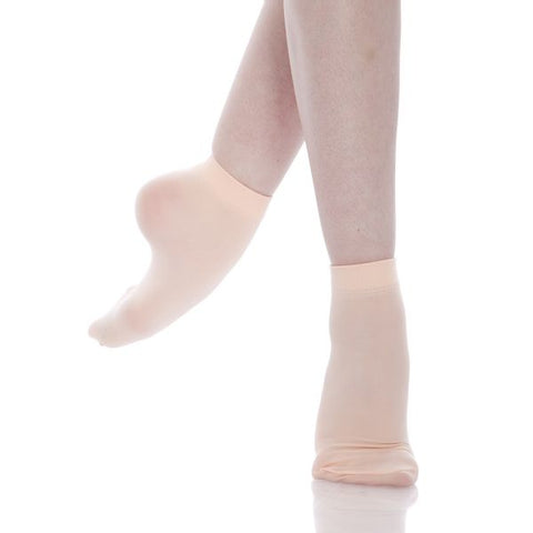 Dance model wearing Energetiks Theatrical Pink Dance Anklet socks en demi pointe
